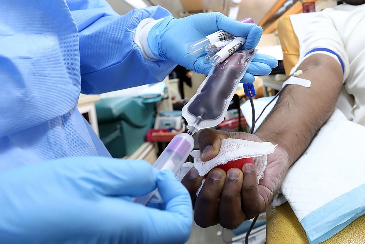 A person donating plasma