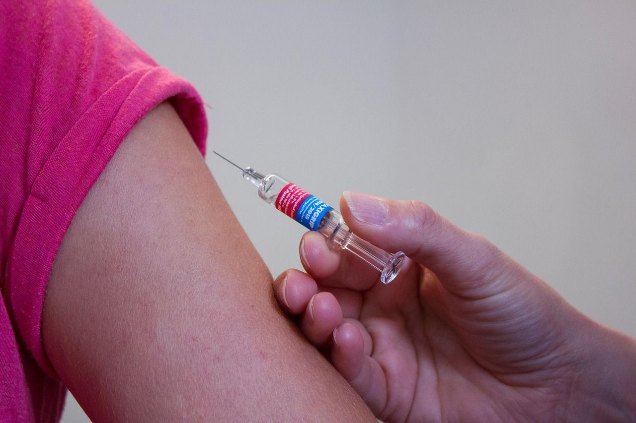 A vaccine injection being given