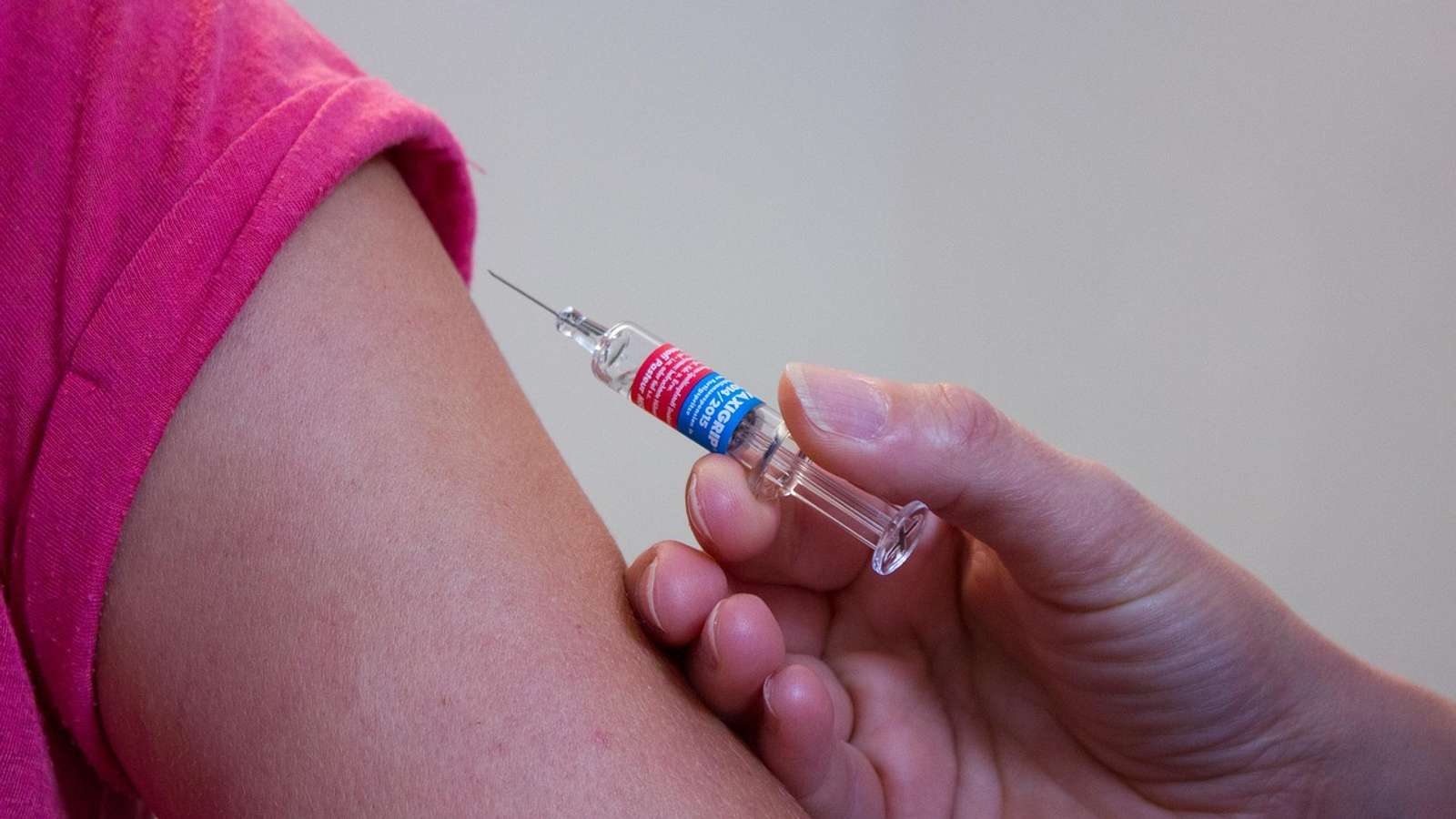 A vaccine injection being given