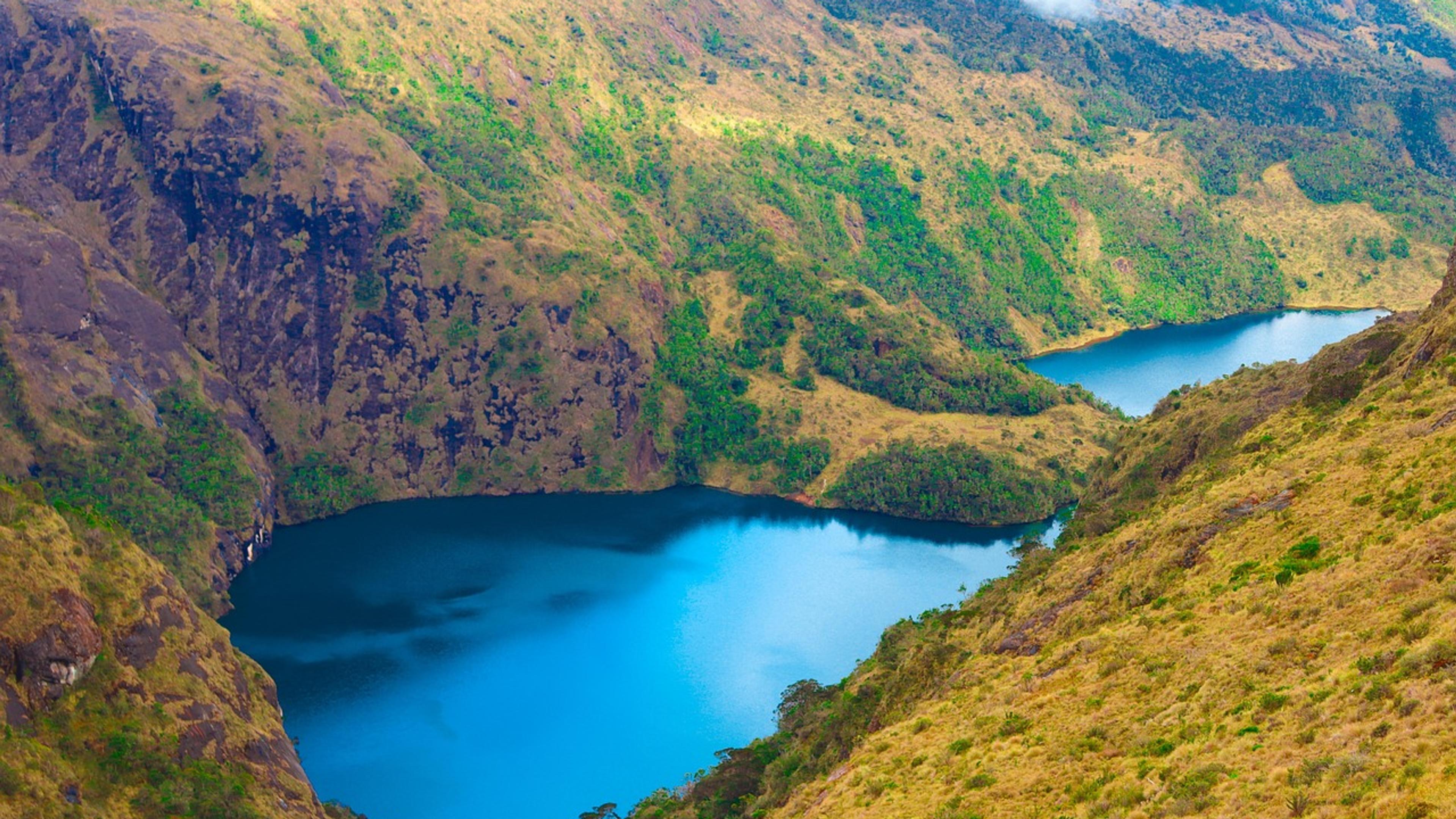 Blue mountain lakes in a green valley near Mount Wilhelm, Papua New Guinea