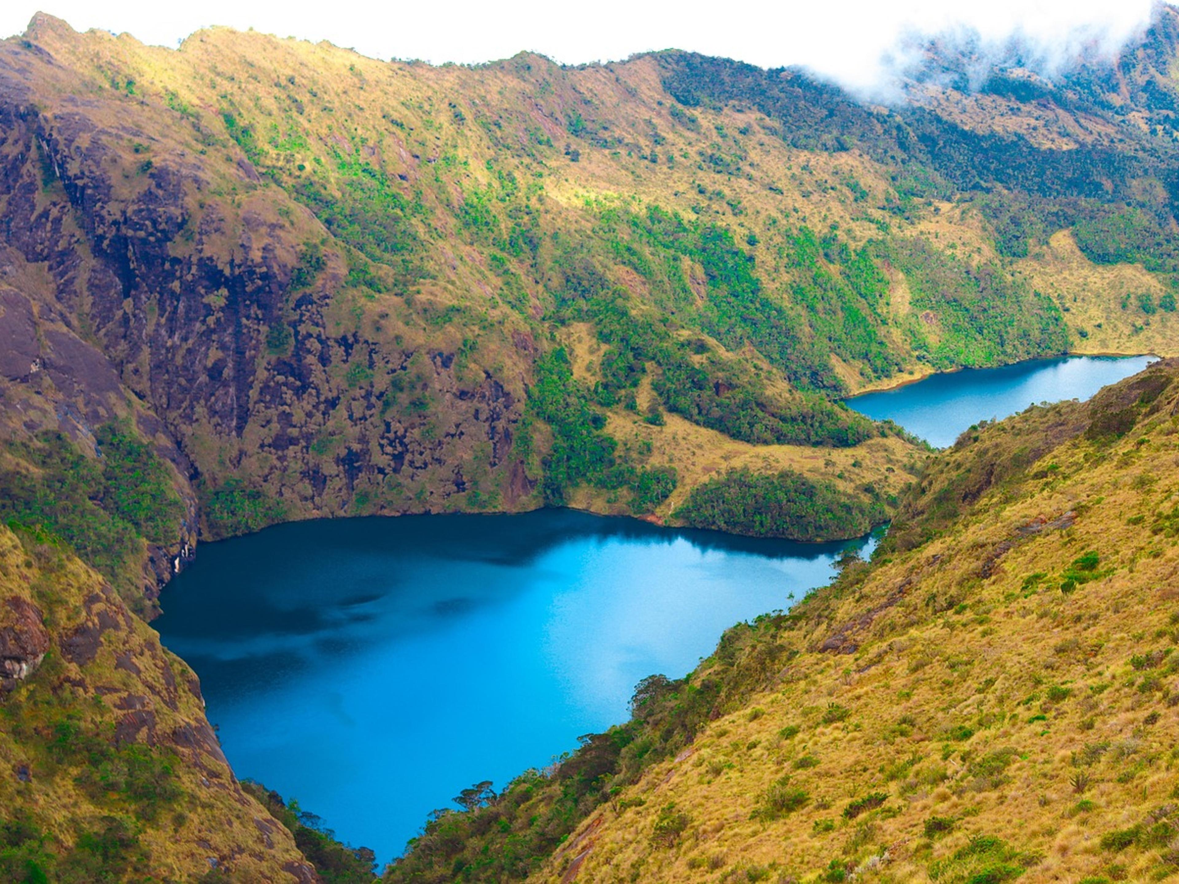 Blue mountain lakes in a green valley near Mount Wilhelm, Papua New Guinea