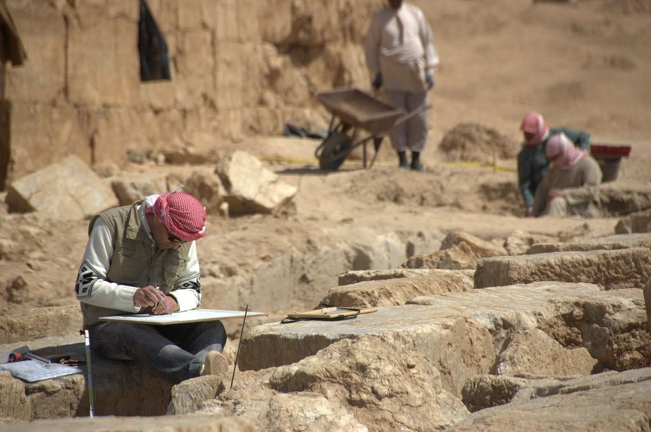 Archaeologists working at an excavation site in Syria
