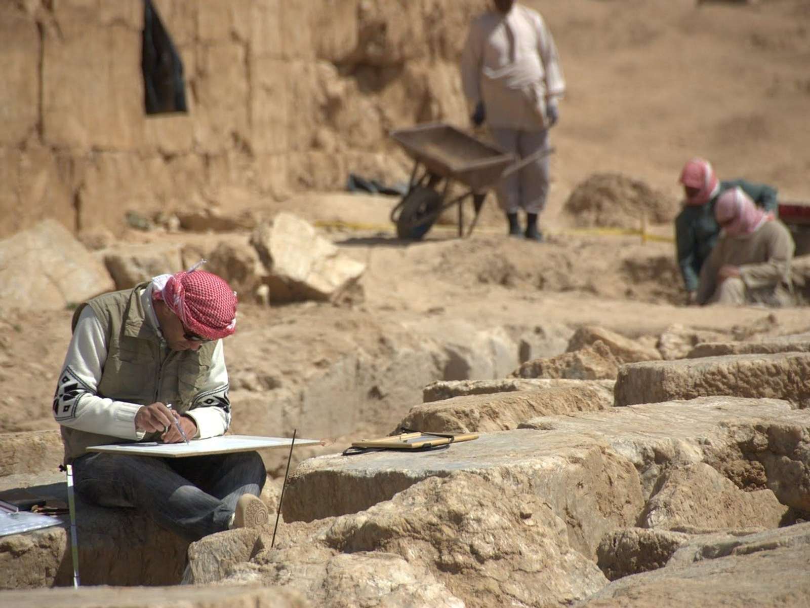 Archaeologists working at an excavation site in Syria