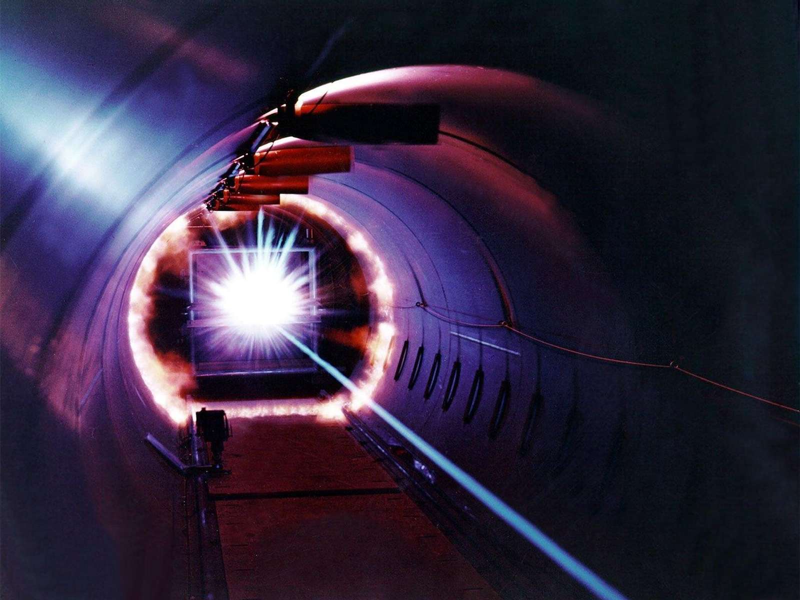 Bright laser light beam in a research laboratory