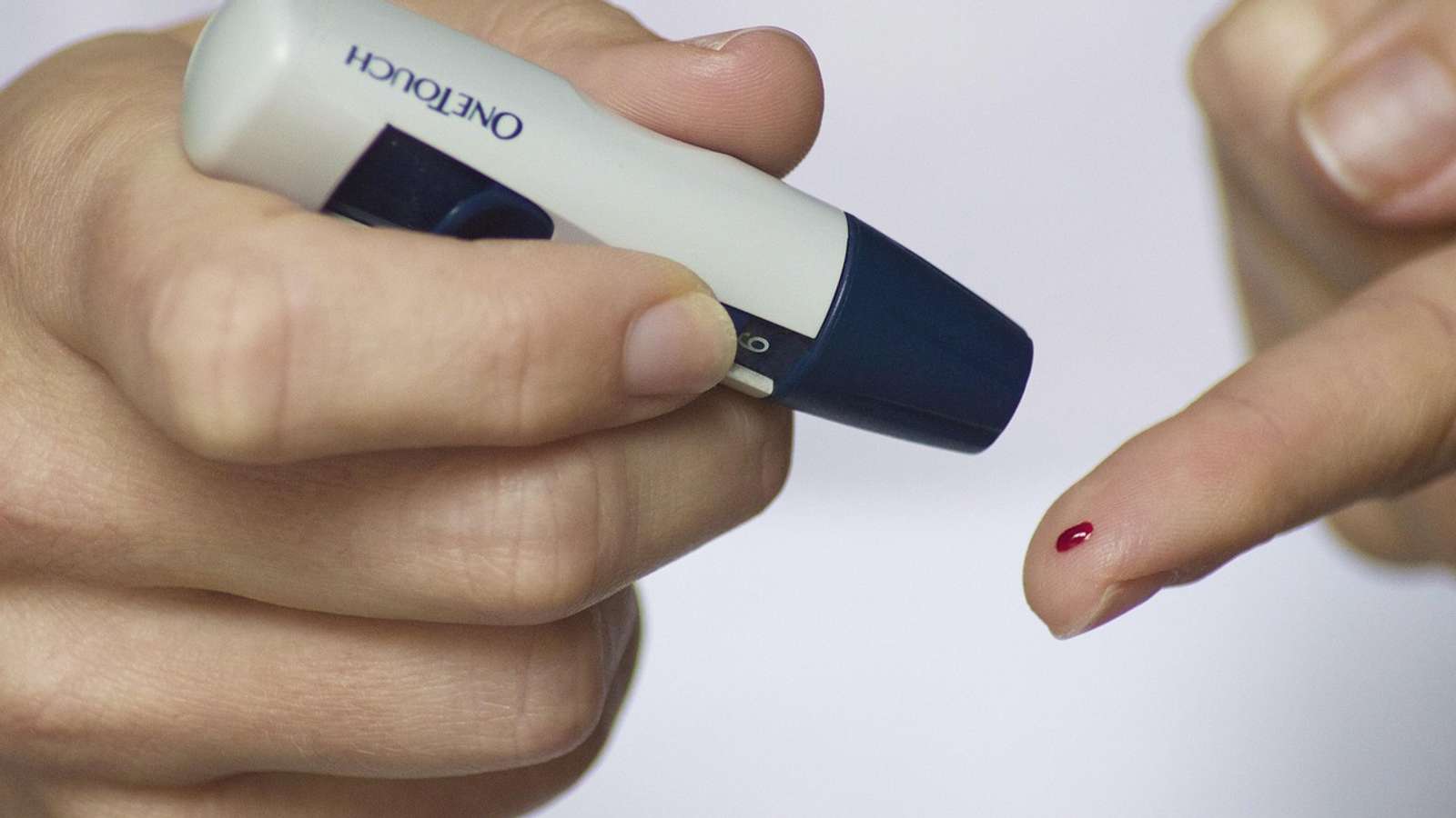 A finger-prick blood glucose test