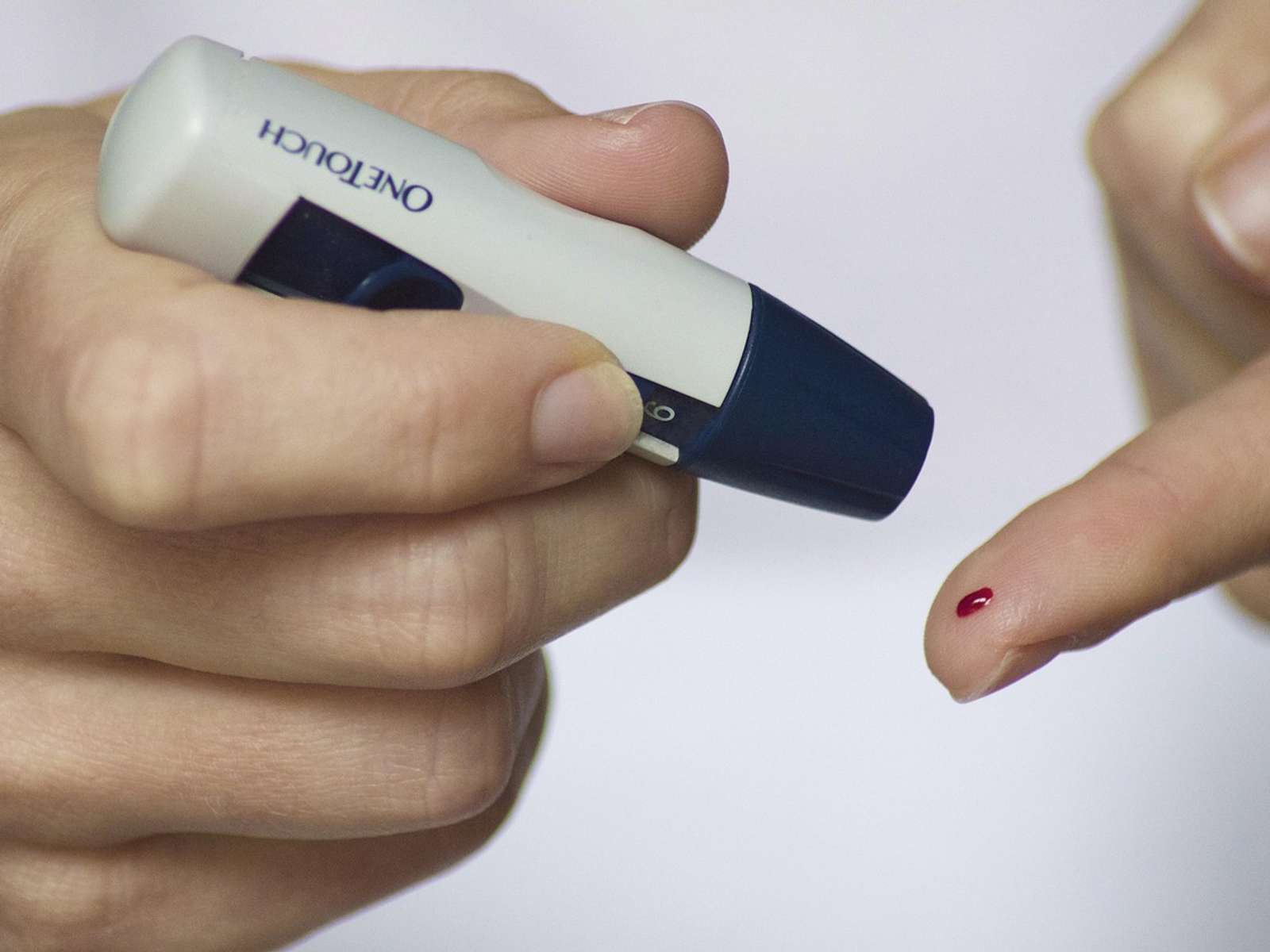 A finger-prick blood glucose test