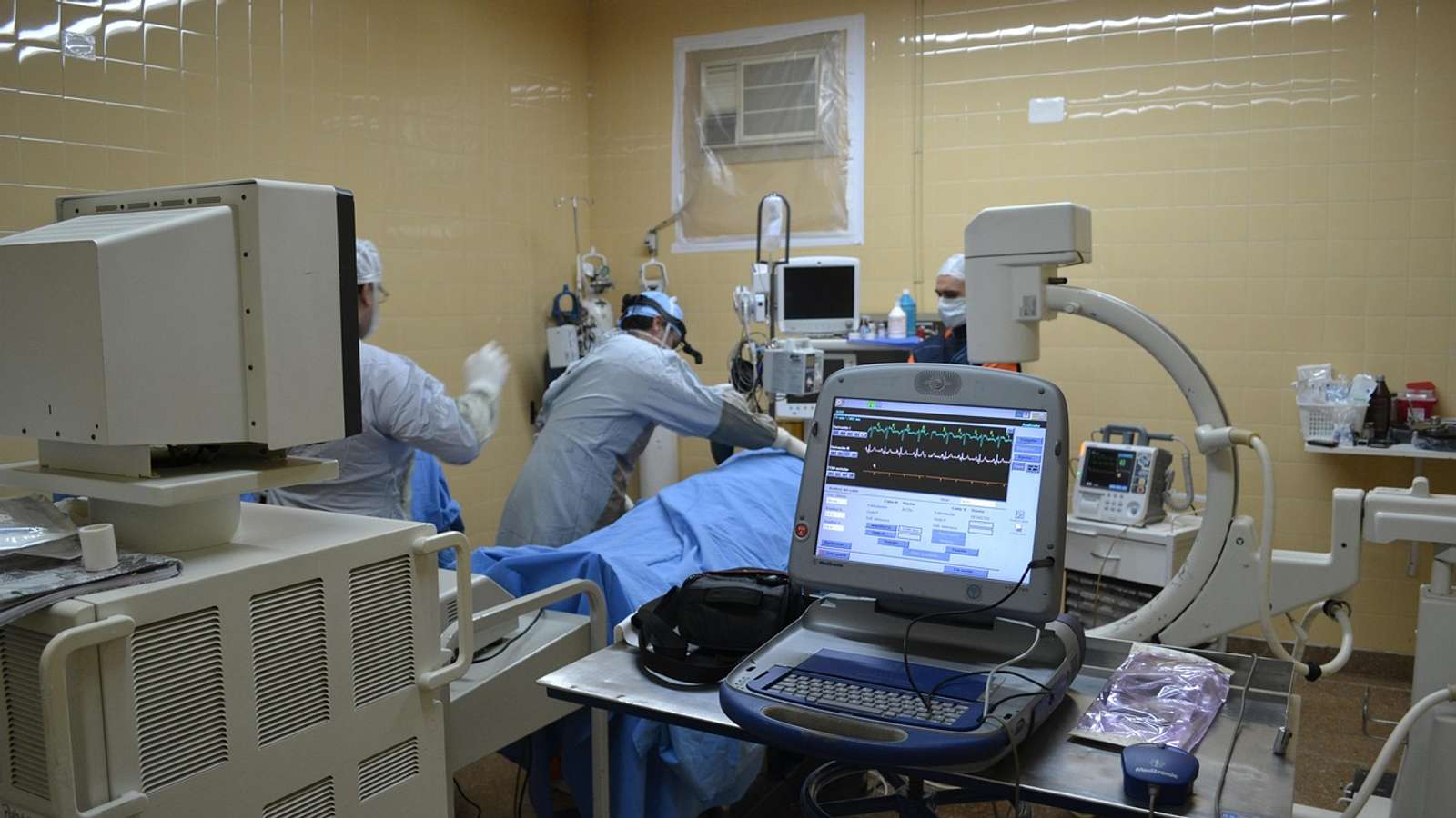 Surgeons at work in an operating room