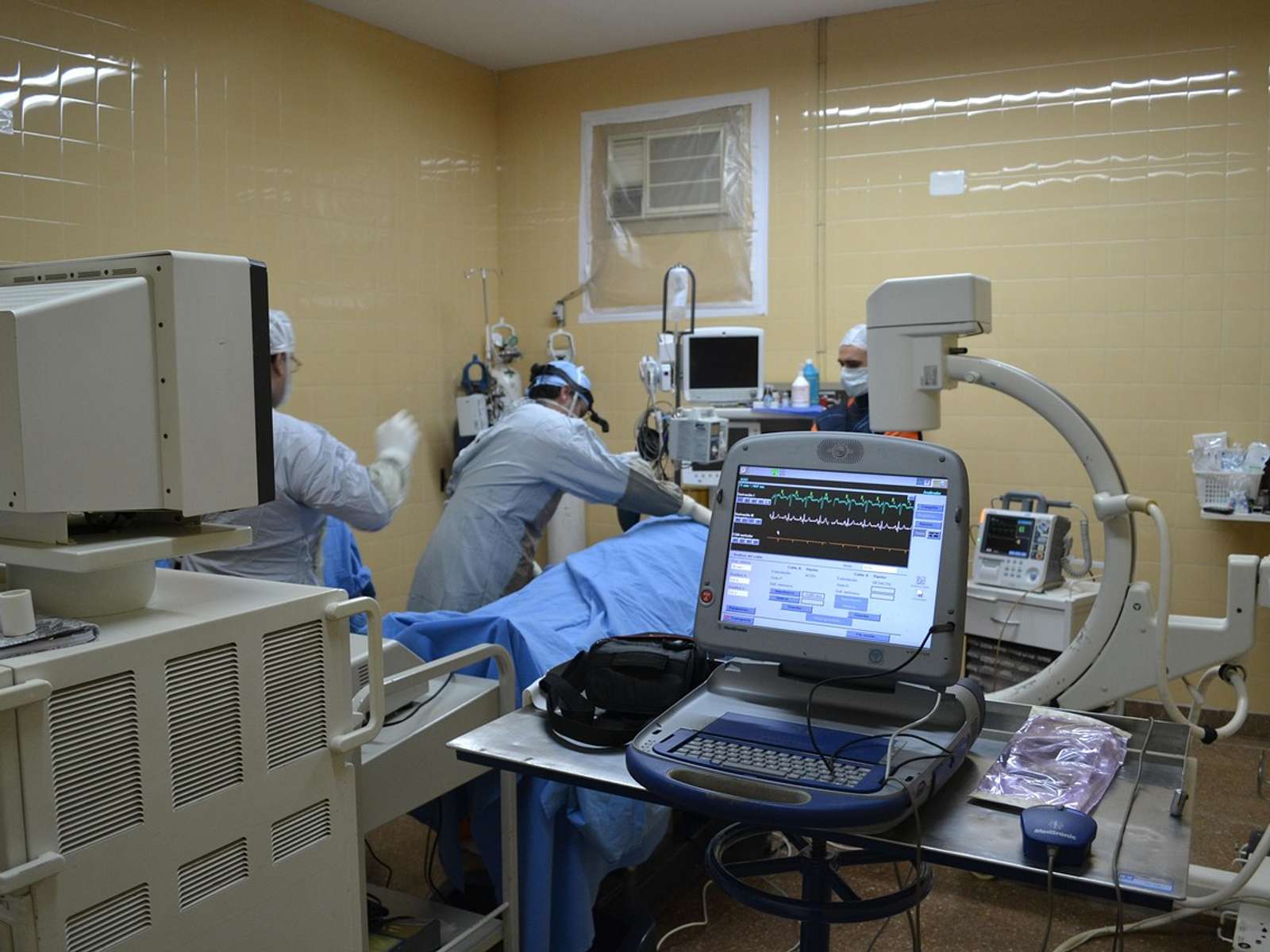 Surgeons at work in an operating room
