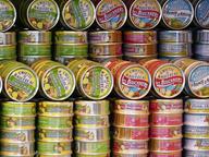 Shelf stocked with canned food donations