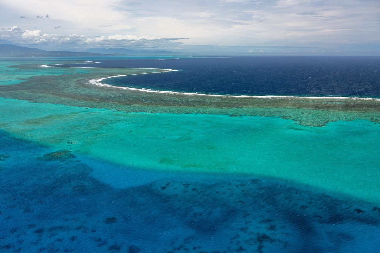 An atoll lagoon ringed by coral reef