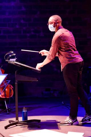 Conductor of the Mind on Fire orchestra.