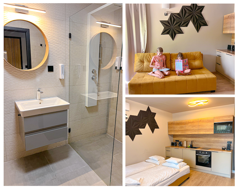 Baño y salón-comedor en Optimus Residence