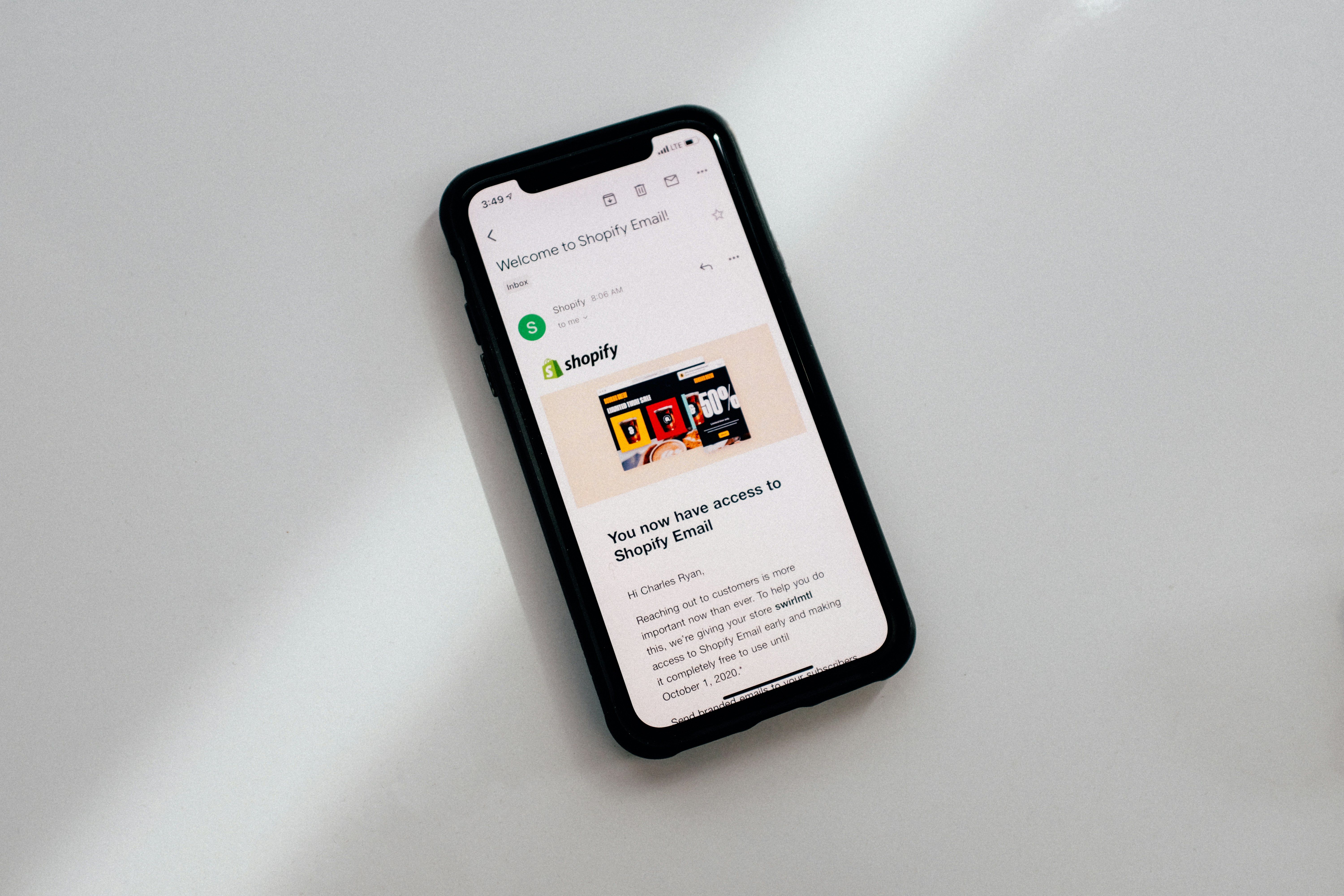 Smartphone displaying a Shopify Email welcome message.