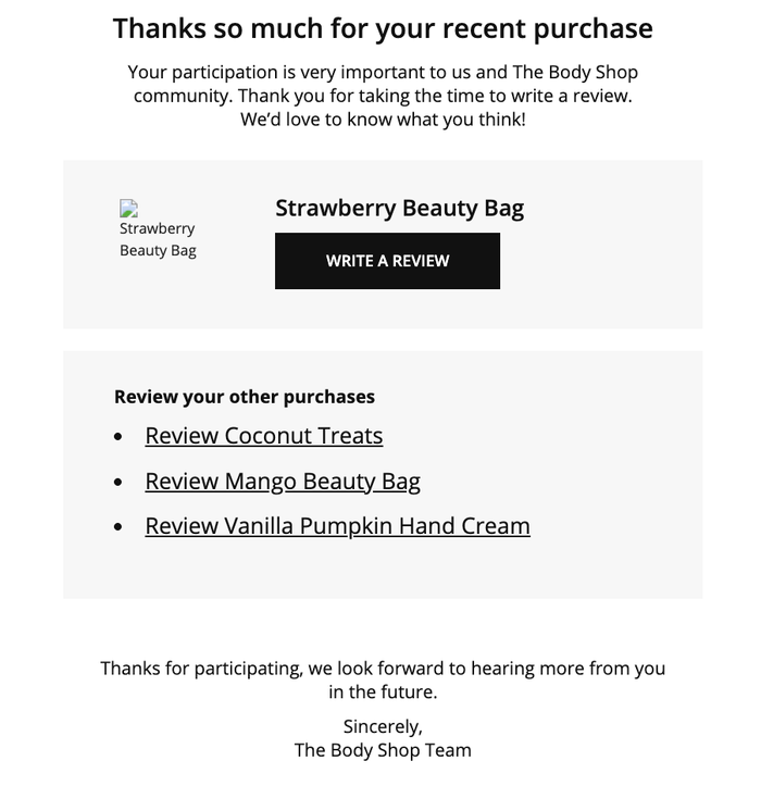 Thank-you email from The Body Shop inviting customers to review the Strawberry Beauty Bag and other recent purchases.
