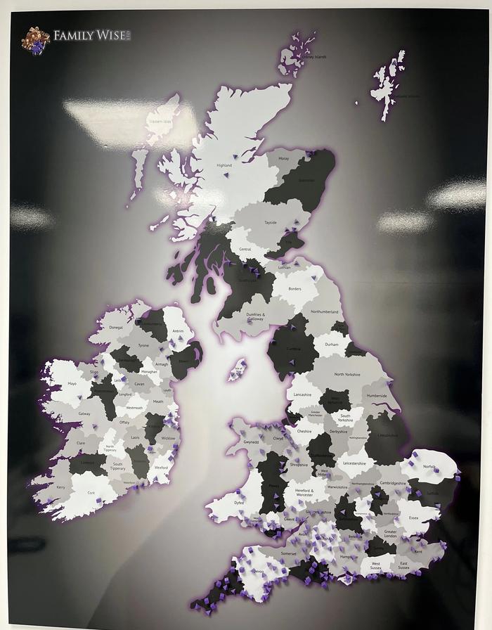 a black and white map of the united kingdom says family wise