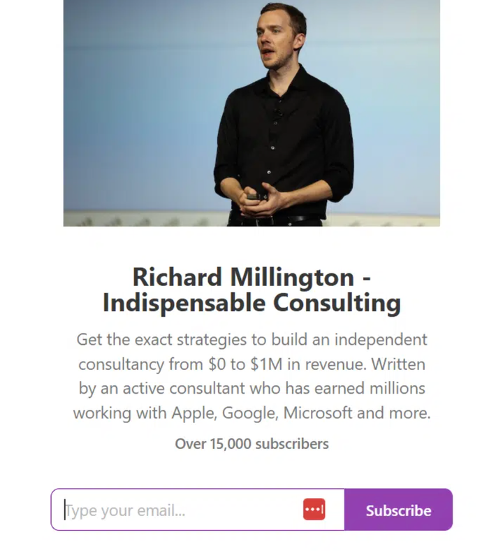 Richard Millington speaking on a stage.