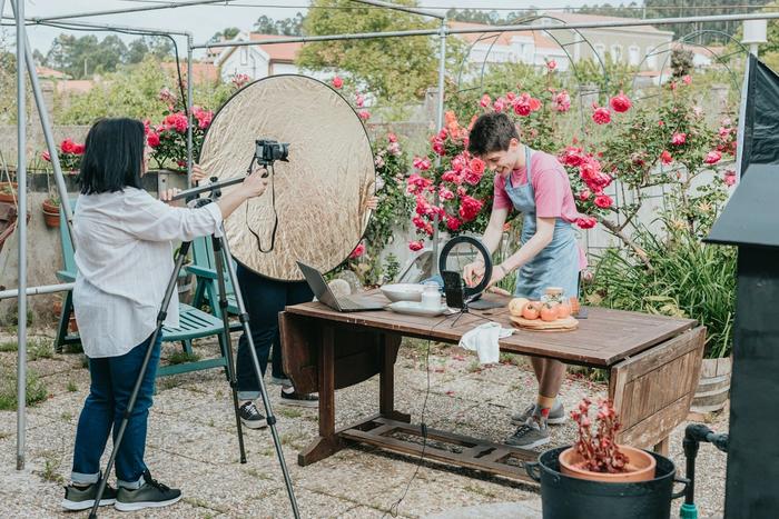 People filming a cooking video