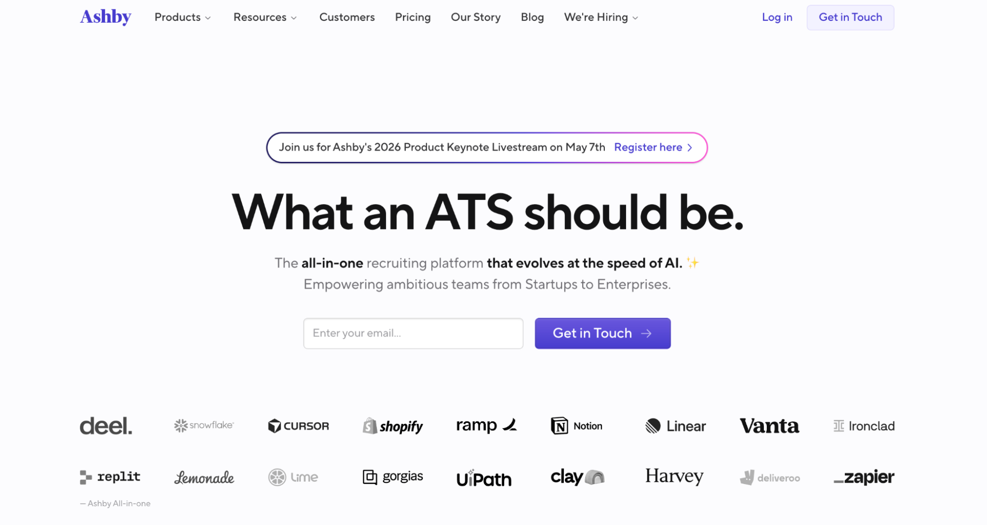 The Ashby website homepage, highlighting their AI-powered ATS and a list of client logos.