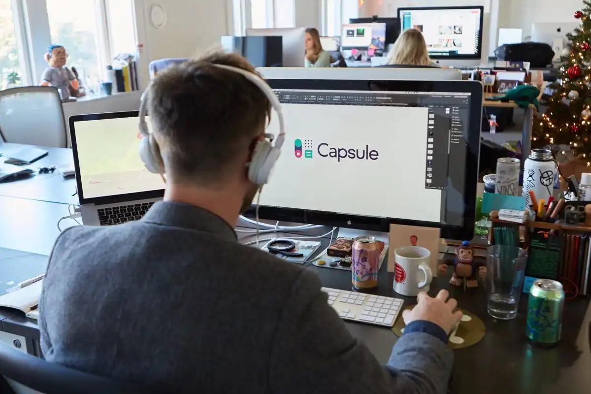 Designer creating Capsule logo
