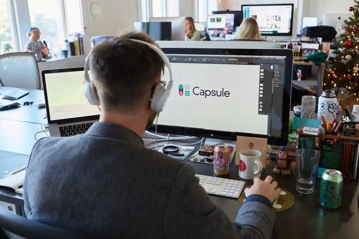 Designer creating Capsule logo