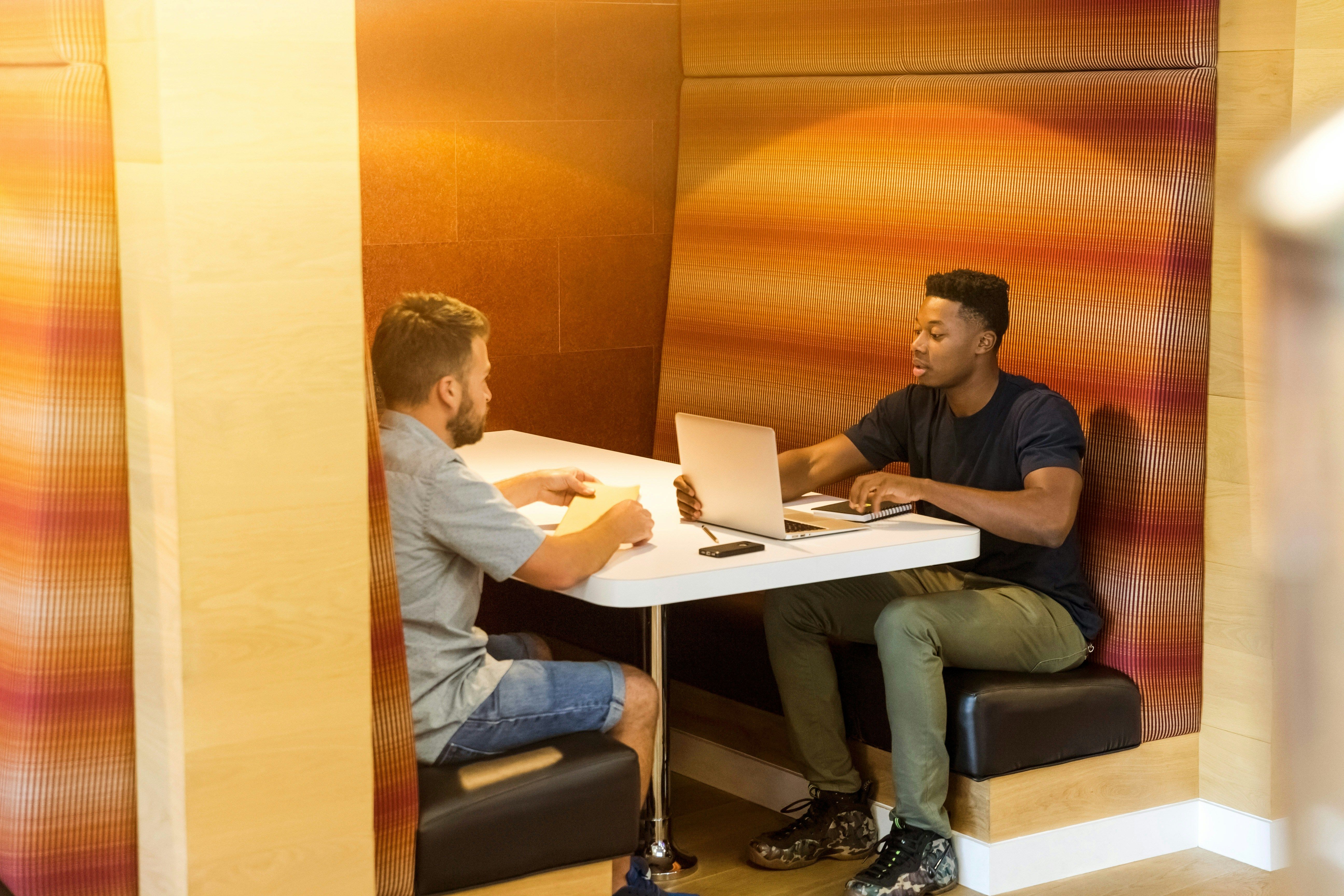 two people working at a desk
