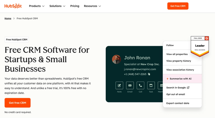 HubSpot CRM page displaying a contact card for John Ronan with a dropdown menu showing 'Summarize with AI' highlighted, and a 'Leader' badge.