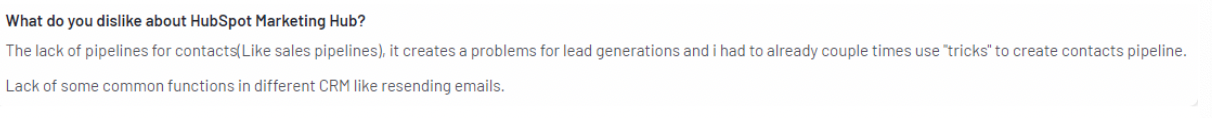 HubSpot Marketing Hub review snippet about missing contact pipelines and common CRM functions.