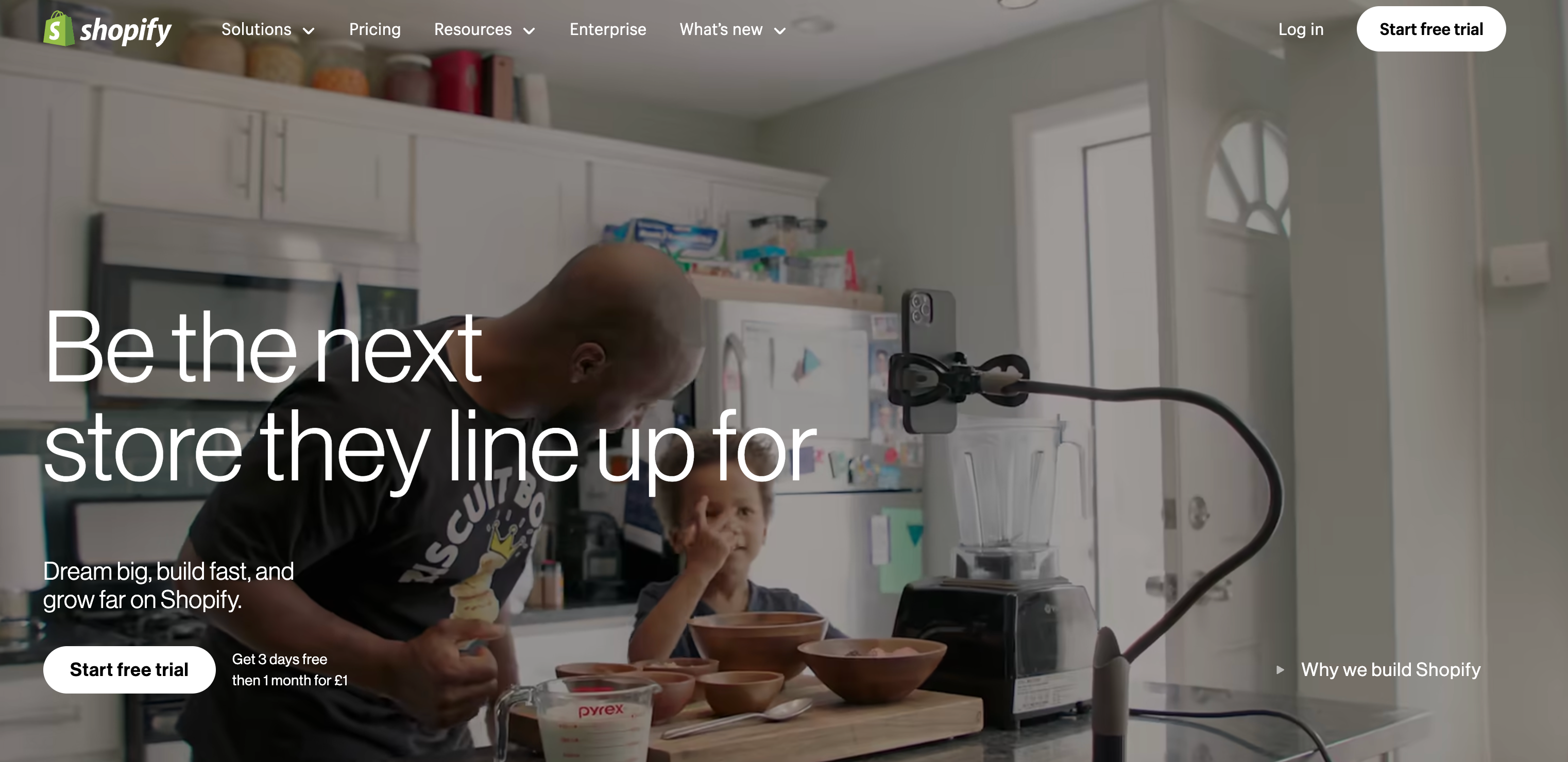 a shopify website shows a man and a child in a kitchen