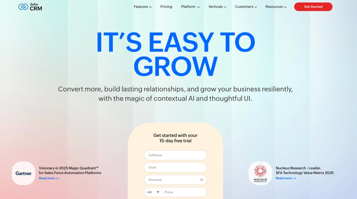 Zoho CRM landing page featuring the headline "IT'S EASY TO GROW," a sign-up form for a 15-day free trial, and recognition from Gartner and Nucleus Research.