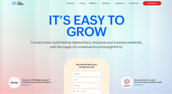 Zoho CRM landing page featuring the headline 'IT'S EASY TO GROW', a free trial sign-up form, and industry recognition.