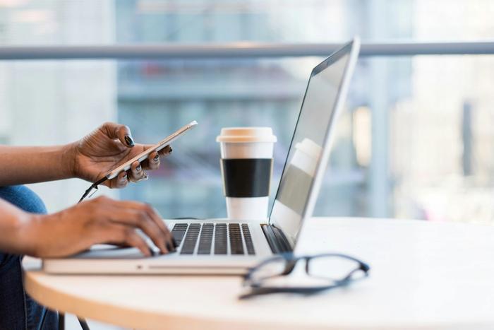 using a phone while working at a desk