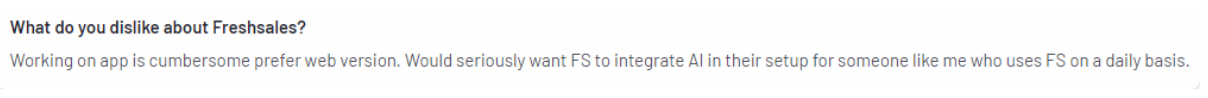 Freshsales review snippet about a cumbersome app experience and missing AI features.