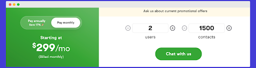 a computer screen with a green button that says chat with us