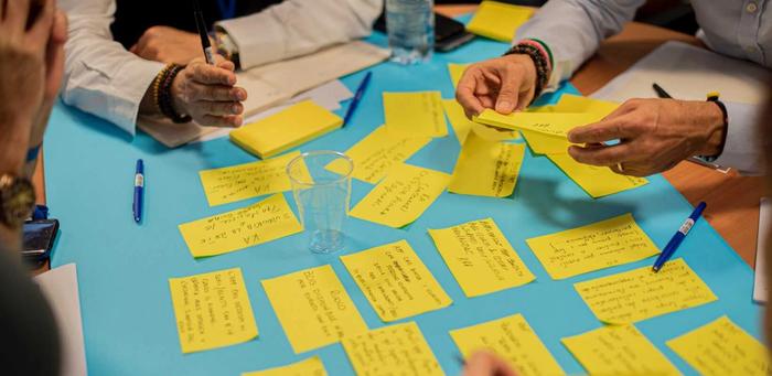 Images shows people planning optimizations for onsite content creation