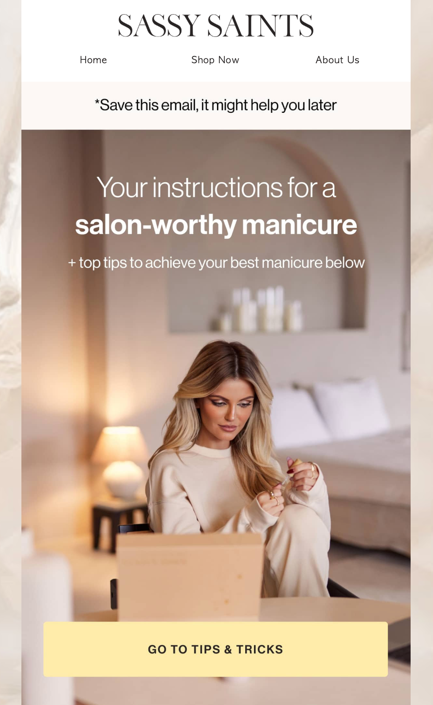an email from sassy saints shows a woman sitting in front of a laptop