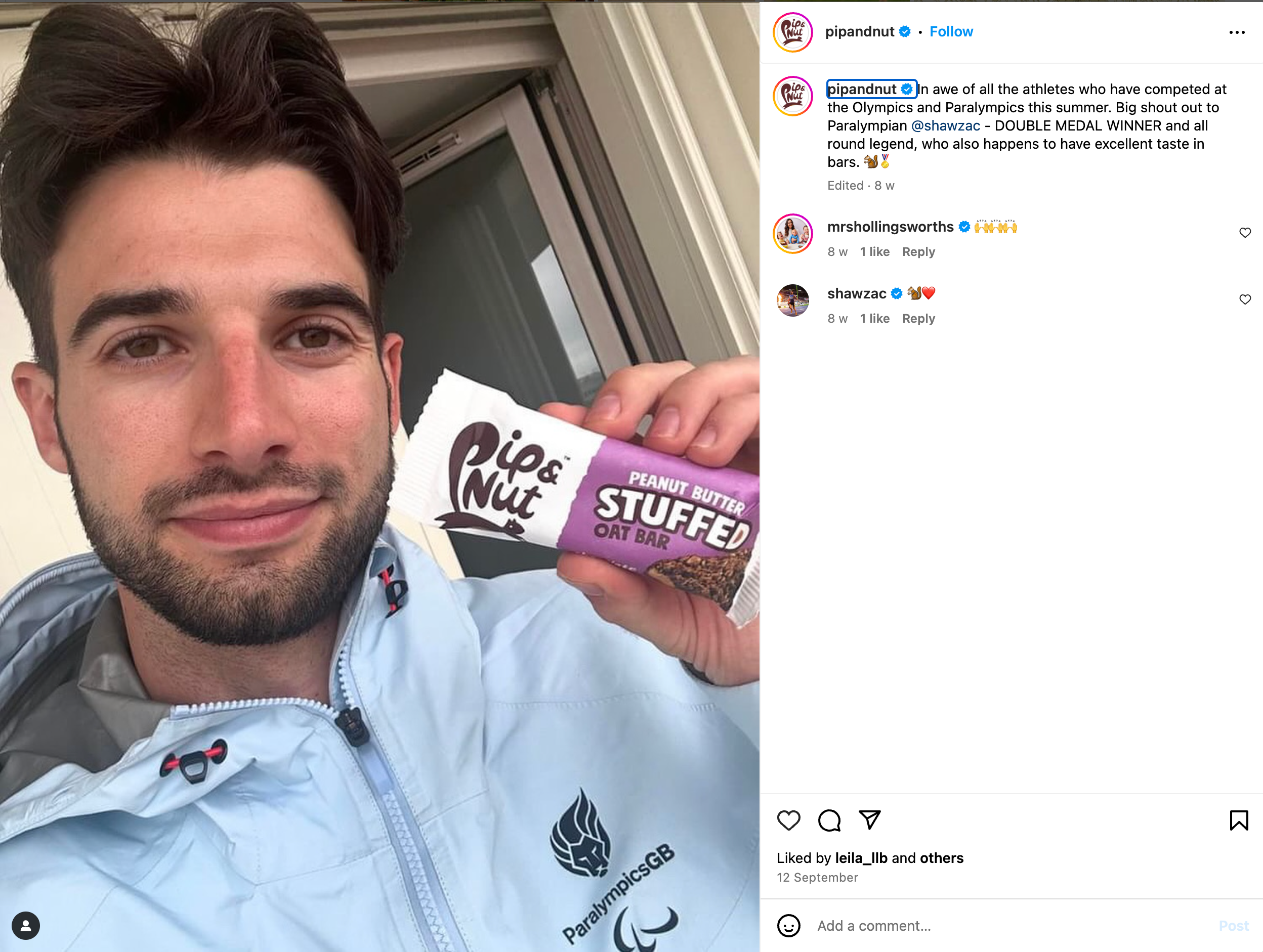 a man is holding a peanut butter stuffed cat bar