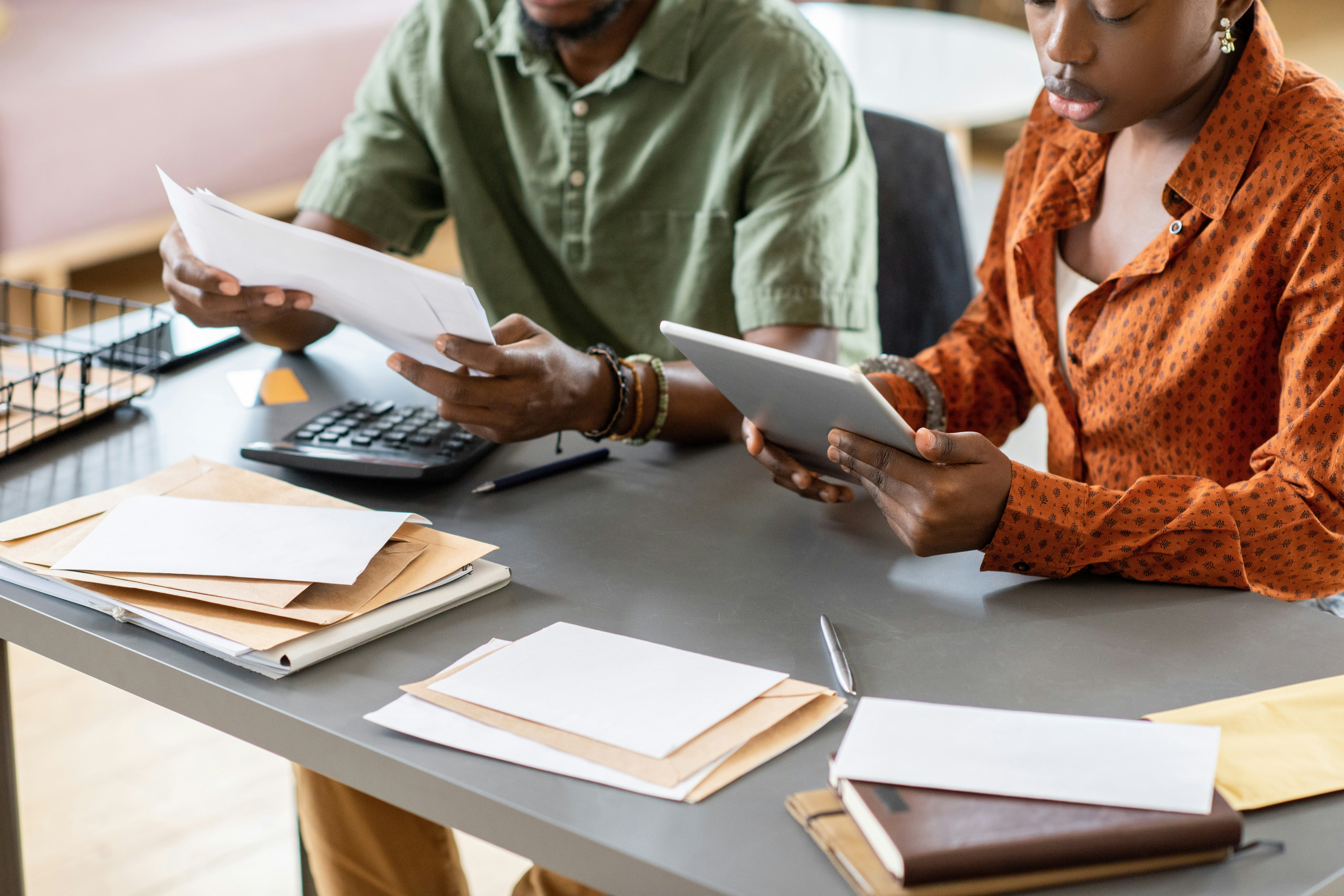 two people reviewing a budget