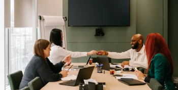 People meeting around a meeting table