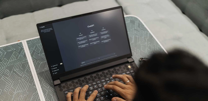 Someone using ChatGPT on a laptop