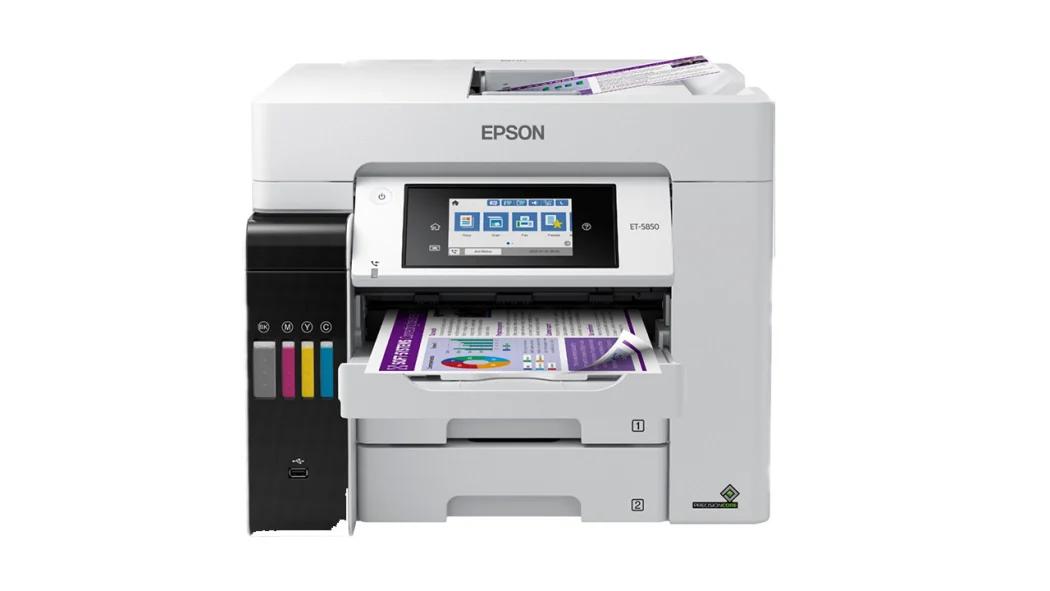 an epson printer is sitting on top of a white table .