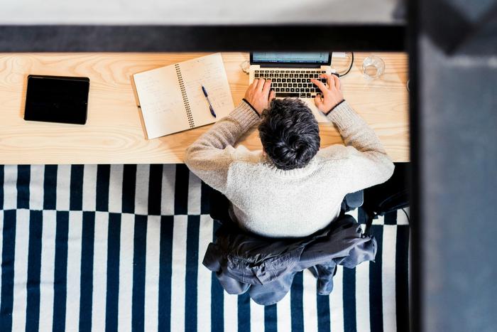 arial shot of someone working on a laptop