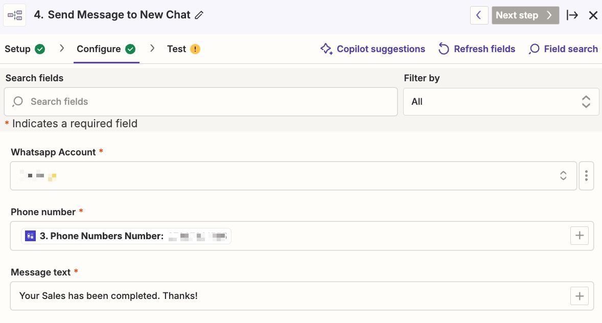 showing the zapier fields for the whatsapp account, phone number and message text