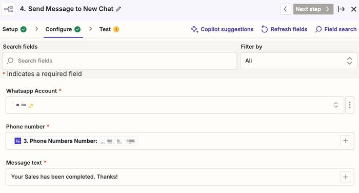 showing the zapier fields for the whatsapp account, phone number and message text