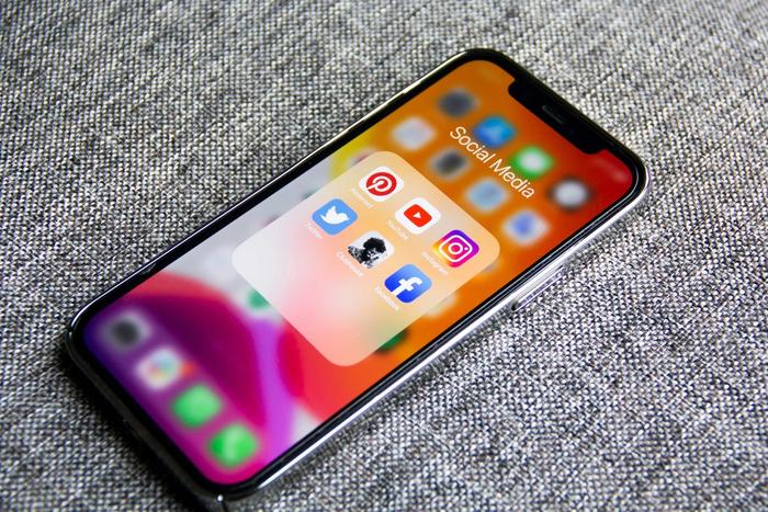 a phone showing social media apps