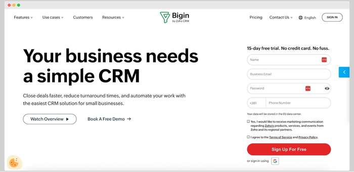 Clean landing page for Bigin by Zoho CRM with bold text promoting simplicity for small businesses, a free trial signup form, and call-to-action buttons for demo and overview.