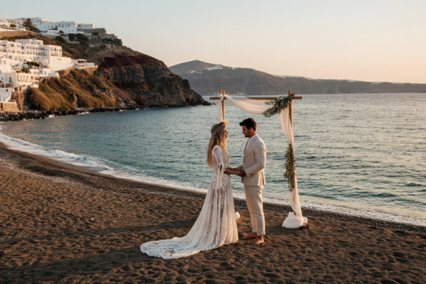 Barefoot Bliss: Charlotte and David's Sunset Beach Wedding in Santorini