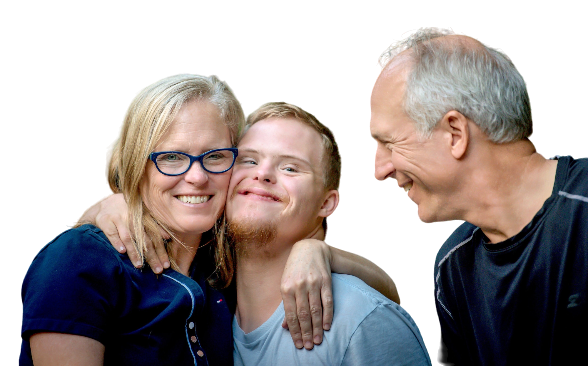 Parents embrace their smiling adult son with Down syndrome