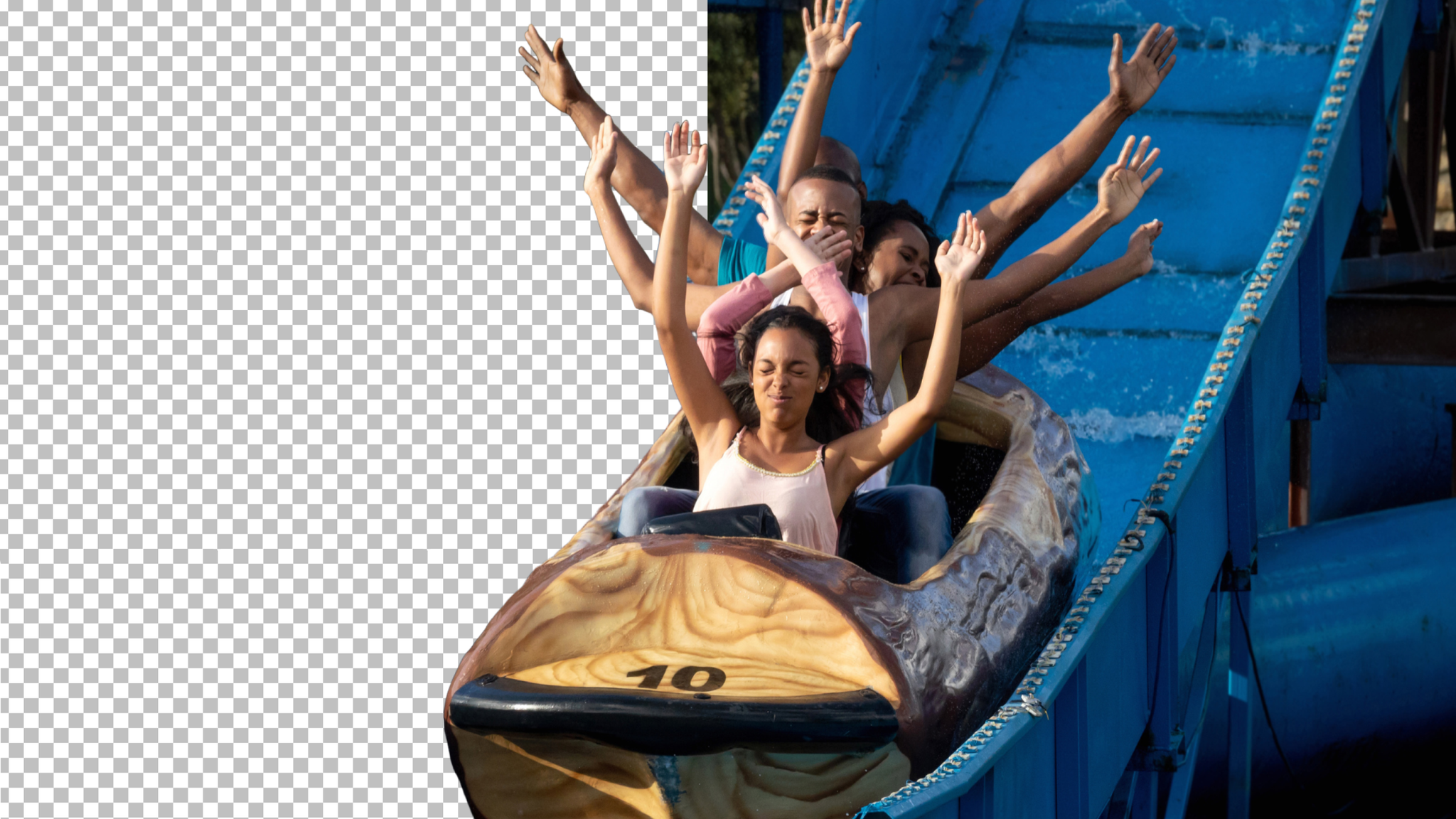 People raise their hands while descending a water ride