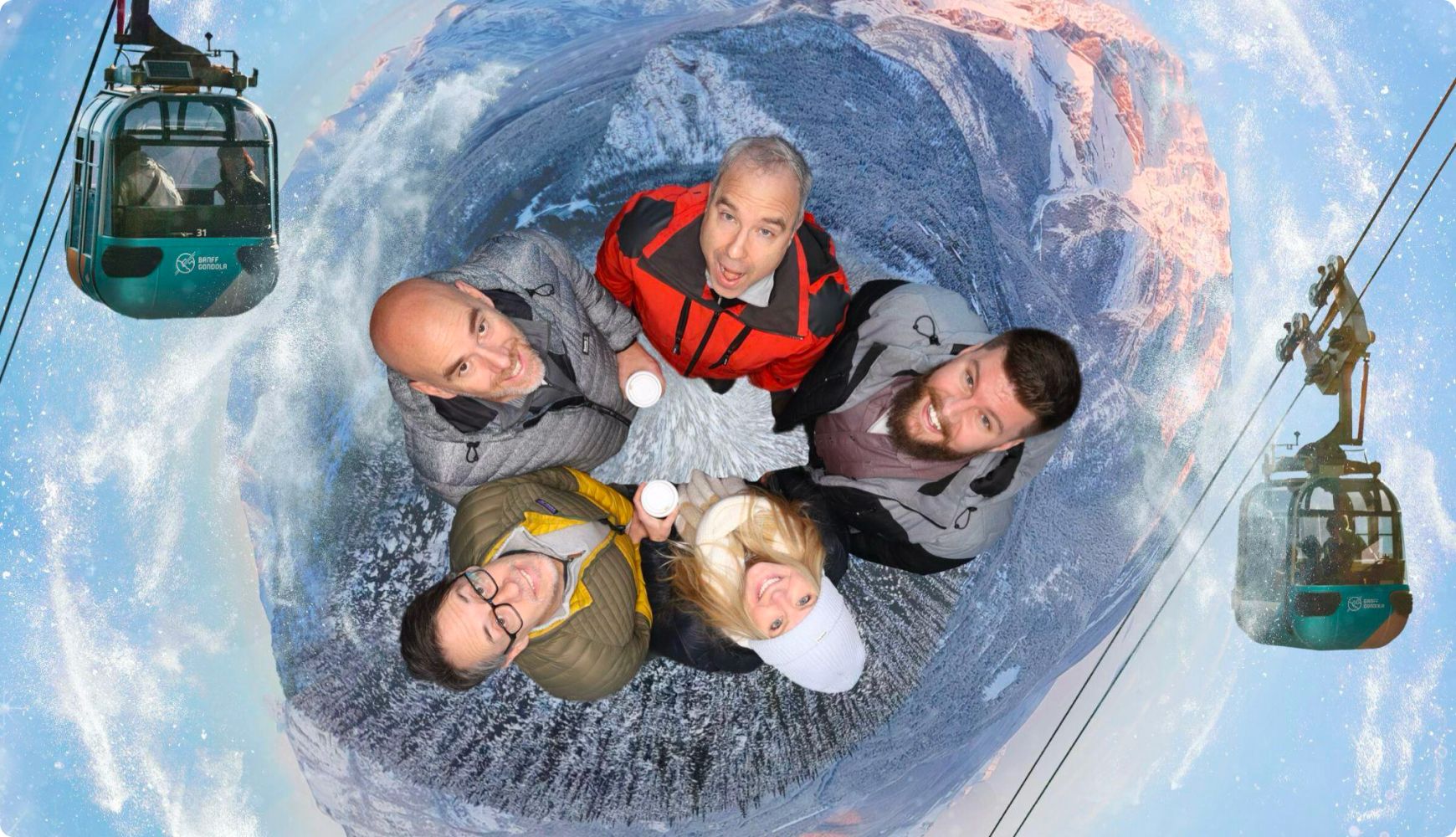 Five people look up from a snowy mountain beneath cable cars