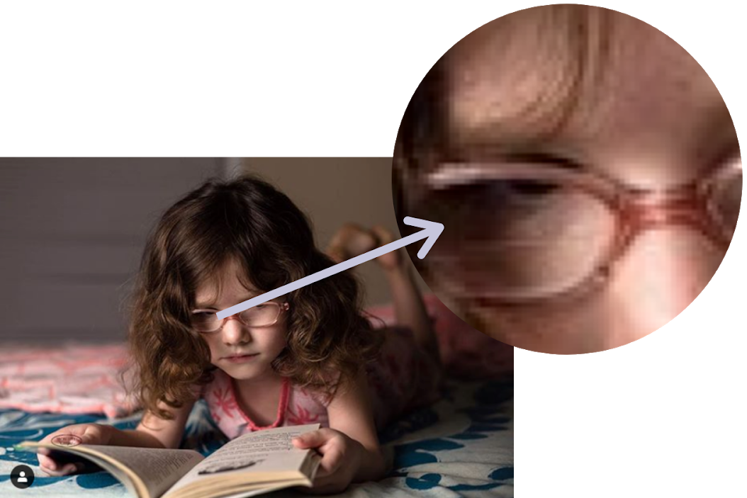 Girl wearing glasses reads a book, with glasses enlarged in inset